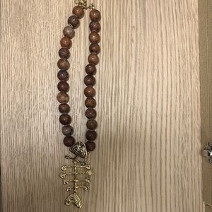 Brown Beaded Necklace with Gold Pendant